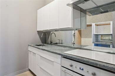First floor gallery kitchen with lacqured cabinetr