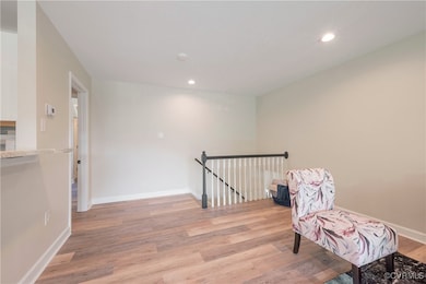 Sitting room with an upstairs landing, new LVP flo