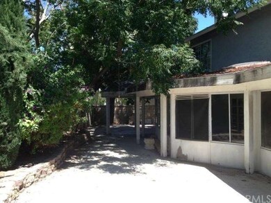 Large concrete area in back yard