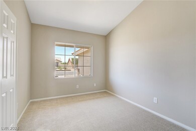 Den with double door entry.