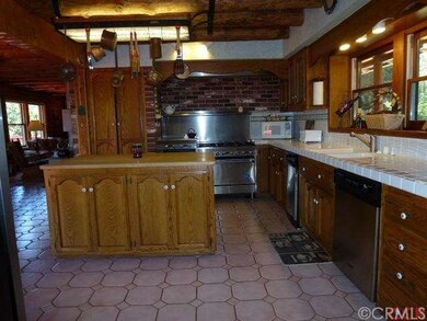 Wonderful kitchen with tile countertops, stainless