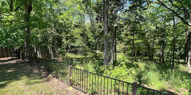 7 Acreage continues into the trees