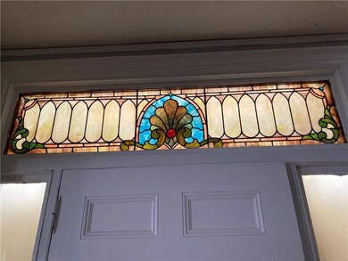front entrance with vestibule and stained glass tr