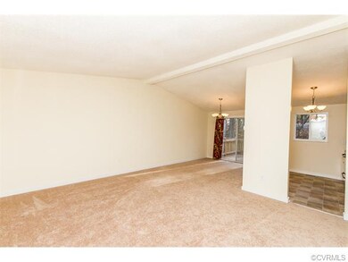 Main level leads to rear deck.