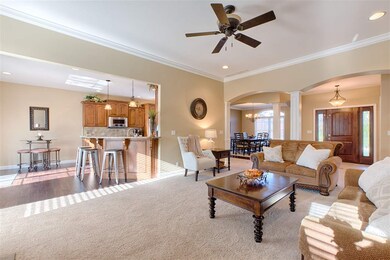 Living room is open to kitchen area.