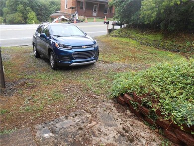 Off-street parking with plenty of room to fit more