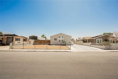 View of front of property featuring a carport and