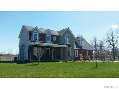 Exterior Front Brick/vinyl exterior, open front po