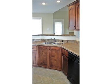 Breakfast bar is open into the Great room.  Enjoy the open floorplan and flow of the home.