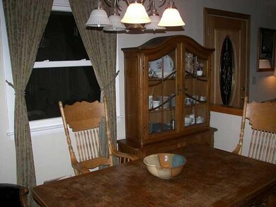 Dining Room Formal dining room is sandwiched by bo
