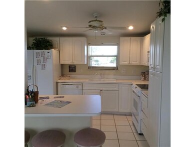 Kitchen. THE BRIGHT KITCHEN AREA IS OPEN TO THE DI