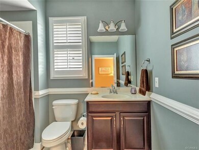 First floor FULL bath with tub/shower, located nex