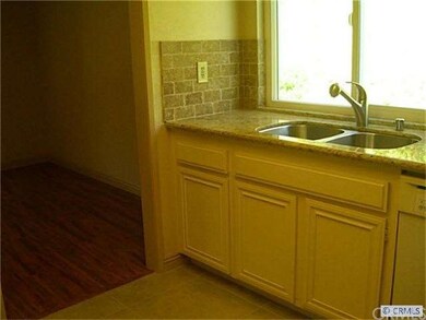 Kitchen opens to dining room.