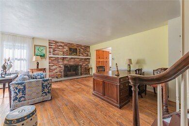 Beautiful hardwood floors in living room with a br