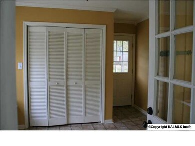 Additional view of laundry room, built in ironing board