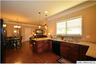 Upgraded Kitchen with granite countertops, pendant