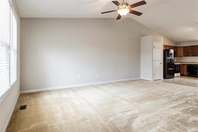 A vaulted ceiling adds to the spacious feel of thi