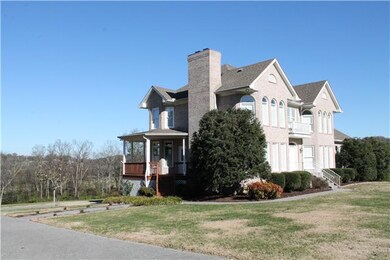 There's a covered porch as well as open deck, sit outside & enjoy the serenity!