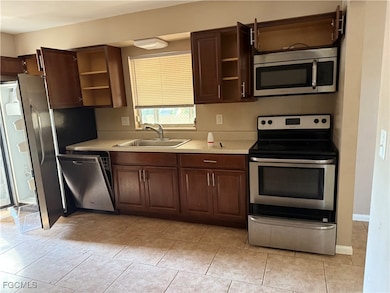 326 Morgan Cir N, Lehigh Acres, FL 33936 - photo 2