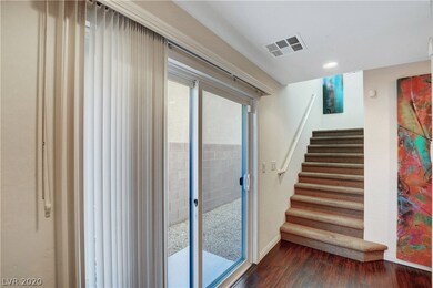 Standing at front door in entry interior.