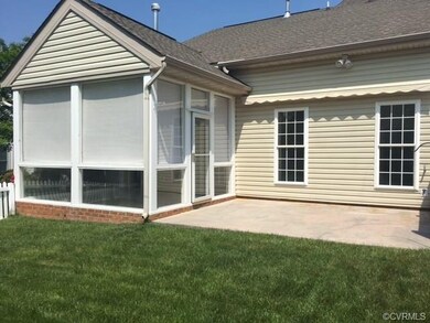 Screened rear porch, rear patio with awning