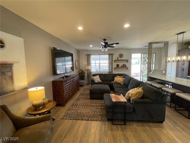 Living room featuring wood finished floors, ceilin