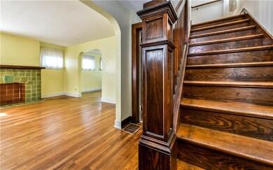 Home boasts gleaming hardwood flooring throughout 