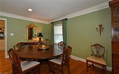 Dining room feels spacious and open.