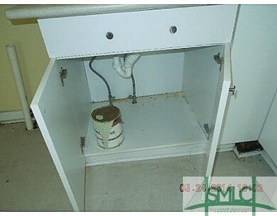 Kitchen. Cabinet under Kitchen sink is clean and u