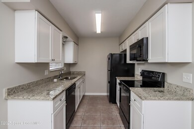 1130 Emerald Rd SE, Palm Bay, FL 32909 - photo 6