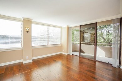 Spacious living room open to dining area.