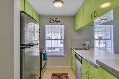 Kitchen featuring stainless steel appliances, a s