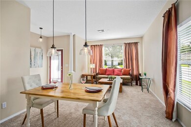 Formal Dining / Living Room with Edison lighting.