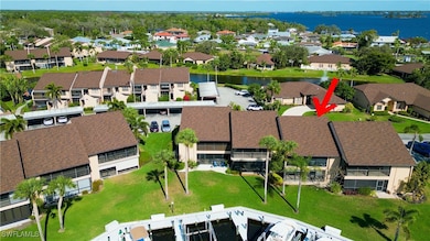 Bird's eye view featuring a water view and a resid