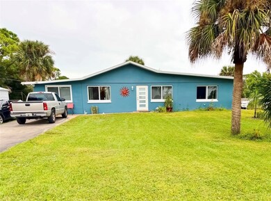 Ranch-style house featuring a front lawn and stucco siding
