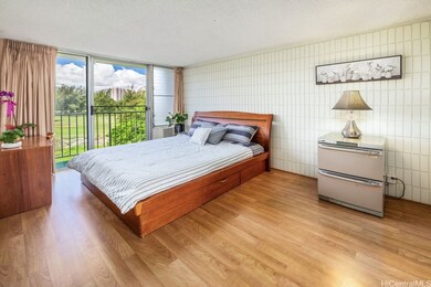Spacious primary bedroom with views