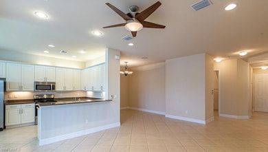 Kitchen with appliances with stainless steel finis