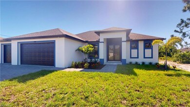 Prairie-style home with a garage, a front yard, stucco siding, driveway, and roof with shingles