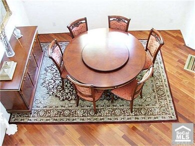 Luxuriously defined formal dining room crowned wit