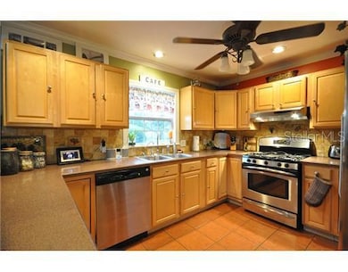 Kitchen - GE Stainless Steel Appliances, check out the Natural Light beaming through that window.