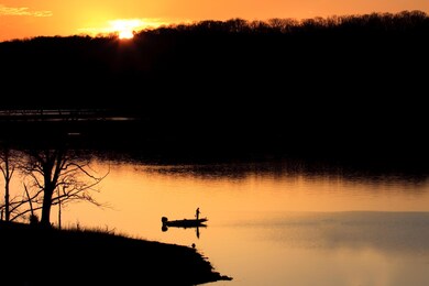 Sunset View Across Lake And Chuck Swan
