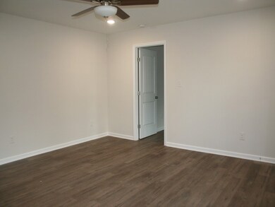 1420 sqft of living area. Laminate floors except for the bathroom.