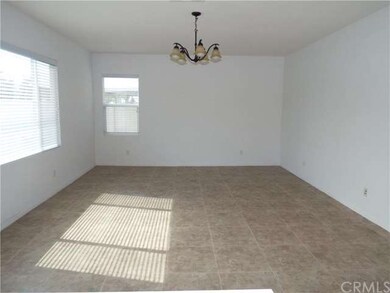 Huge great room with tile floors.