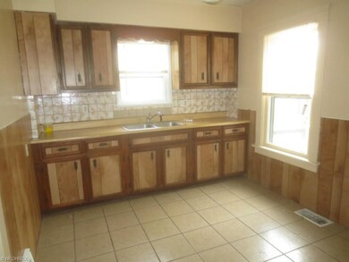 Fresh paint and floors in kitchen.