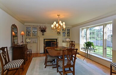 Elegance abounds in the formal dining room, graced