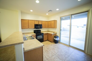 Kitchen overlooking Living Room