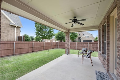 View of terrace featuring ceiling fan