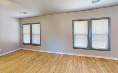 Spare room with light wood-type flooring