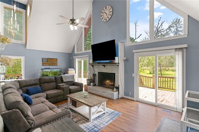Large family room with vaulted ceilings and firepl