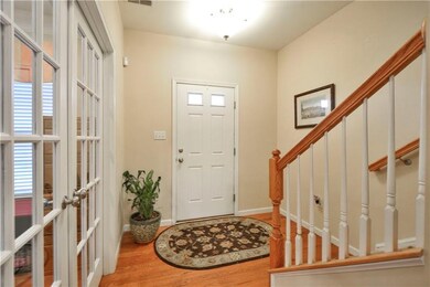 The front door entry.  Oak hardwood floors run thr